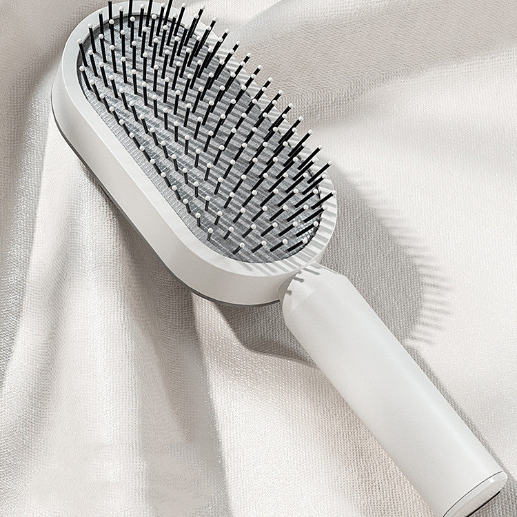 Brosse à cheveux autonettoyante pour femmes Nettoyage à une clé Perte de cheveux Airbag Massage Peigne de cuir chevelu Brosse à cheveux antistatique