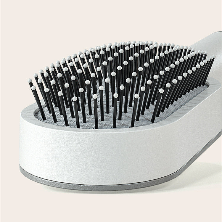 Brosse à cheveux autonettoyante pour femmes Nettoyage à une clé Perte de cheveux Airbag Massage Peigne de cuir chevelu Brosse à cheveux antistatique